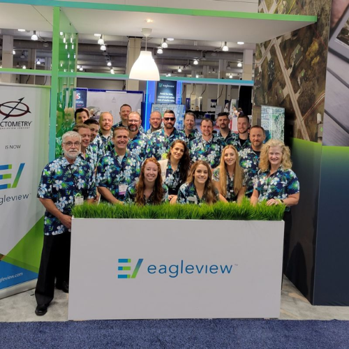 EagleView employees wear Hawaiian shirts for an office party.